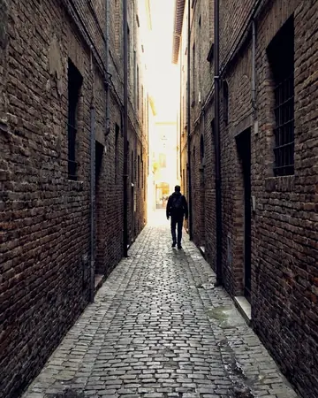 The alley says more in ink. With the Chrome Film preset applied.