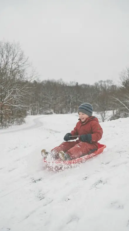 Deckle Rag applied to Child sledding