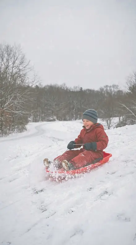 Curtain Flare applied to Child sledding