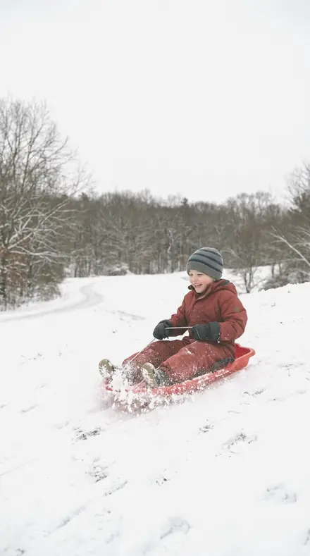Buttermilk Pail applied to Child sledding