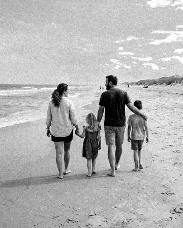 Beach family. With the Mono Film preset applied.