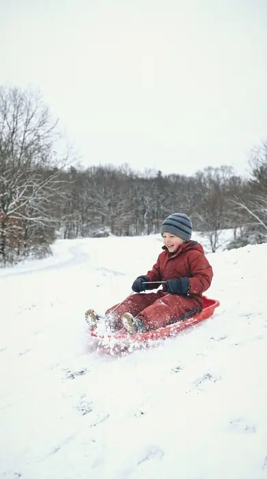 child sledding. With the True Skin preset applied.