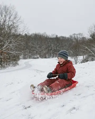 child sledding. Photographed without a preset.