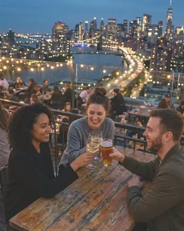 Fictional friends clinking glasses at a rooftop bar at blue hour, city skyline behind. With the Warm Negative preset applied.
