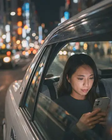View through a taxi window at night, city lights bokeh, fictional passenger's face lit by the phone. With the Warm Negative preset applied.