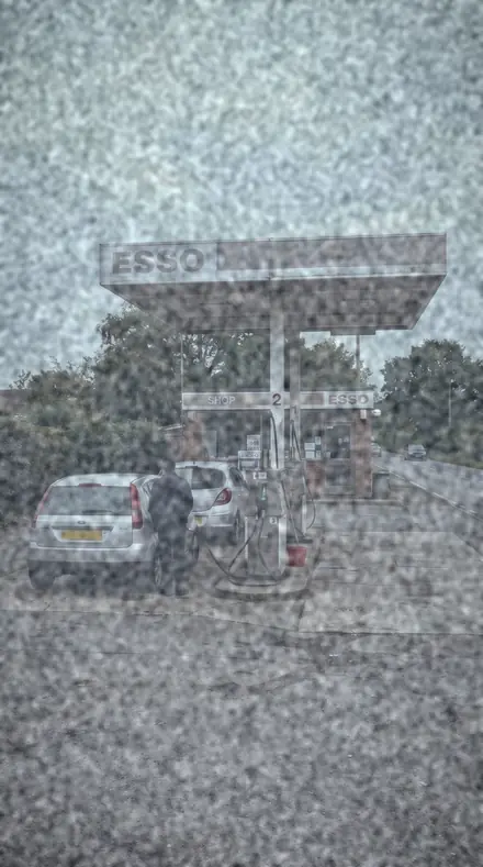 Paper Curl applied to petrol station